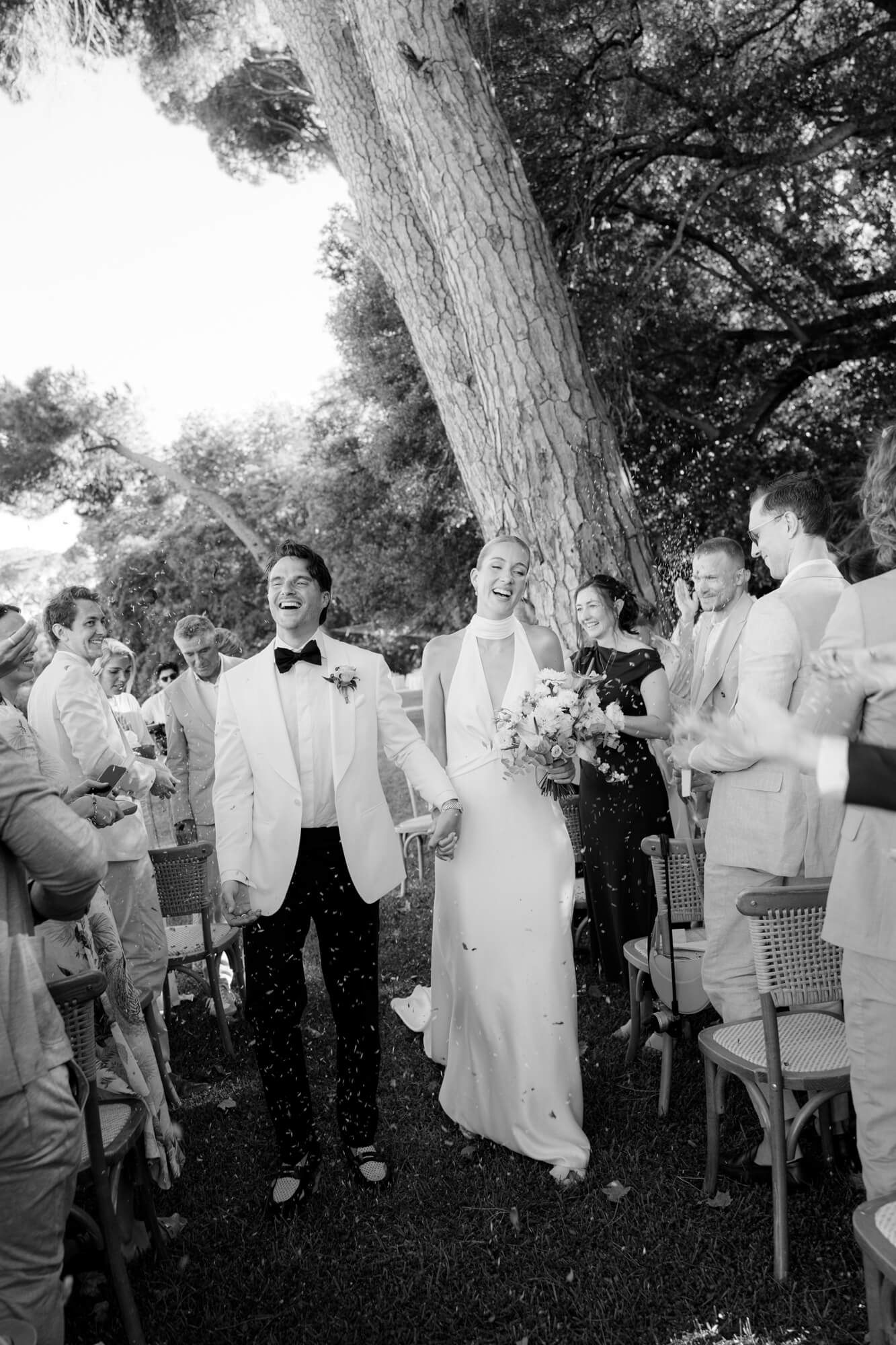 Bridal Couple walks together down the Aisle